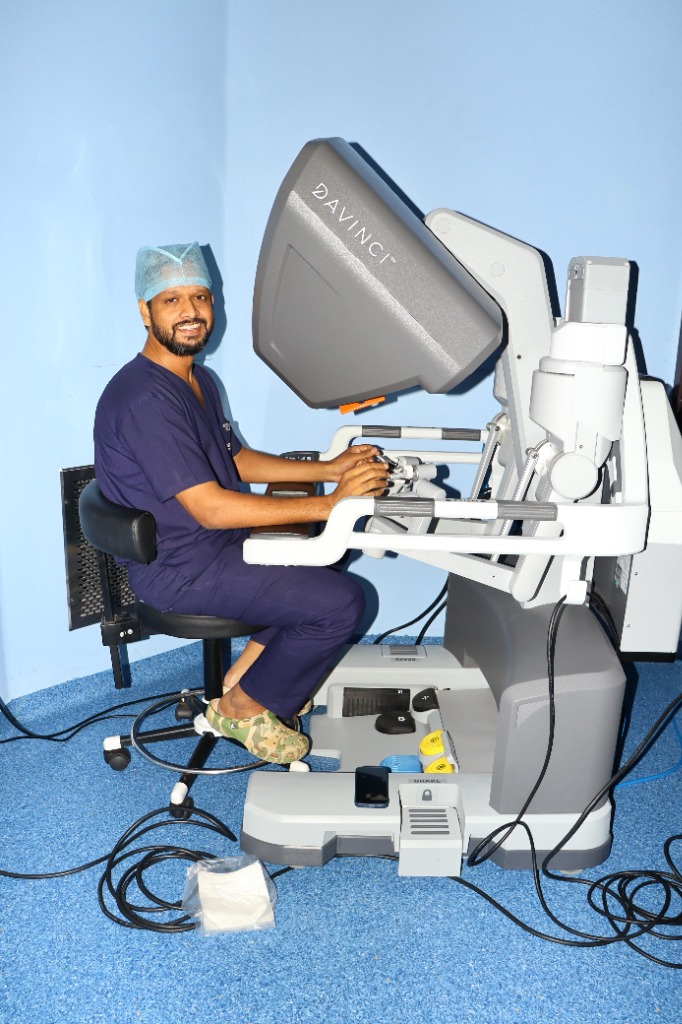 Dr. Harsha with Da Vinci Robotic System